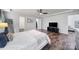 Main bedroom with wood-look flooring, walk-in closet, and ensuite access at 3908 Parkers Ferry Rd, Fort Mill, SC 29715