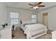 Bright bedroom featuring a ceiling fan, and desk with a view at 3913 Widgeon Way, Waxhaw, NC 28173