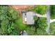 Aerial shot of home showcasing backyard with deck, patio, mature landscaping, and proximity to neighborhood at 4007 Lake Shore S Rd, Denver, NC 28037