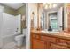 Bathroom featuring a sink and a tiled bathtub at 4007 Lake Shore S Rd, Denver, NC 28037