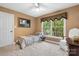 Cozy bedroom featuring a scenic view window and a ceiling fan at 4007 Lake Shore S Rd, Denver, NC 28037