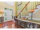 Open foyer with hardwood floors, staircase, and natural light at 4007 Lake Shore S Rd, Denver, NC 28037