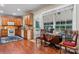 Bright kitchen featuring wood cabinets, hardwood floors, and a breakfast nook at 4007 Lake Shore S Rd, Denver, NC 28037