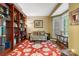 Cozy living room with built-in bookshelves and a bay window at 4007 Lake Shore S Rd, Denver, NC 28037