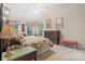 Vaulted main bedroom featuring three windows and a ceiling fan at 4007 Lake Shore S Rd, Denver, NC 28037