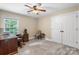 Functional office space with ample desk area, chair, and natural light at 4007 Lake Shore S Rd, Denver, NC 28037