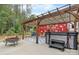 Outdoor patio boasts a hot tub, a fire pit, and a pergola over a seating area complete with outdoor decor at 4007 Lake Shore S Rd, Denver, NC 28037