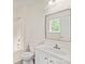 Neat bathroom features a bathtub, toilet, and modern vanity sink at 425 Austin Dr, Charlotte, NC 28213