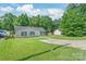 Charming single-story home with well-maintained lawn, blue shutters, and a spacious driveway at 425 Austin Dr, Charlotte, NC 28213