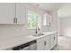 Bright kitchen showcasing a stainless steel sink and modern countertops at 425 Austin Dr, Charlotte, NC 28213