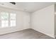 Inviting living area with modern flooring, a ceiling fan, and natural light from windows at 425 Austin Dr, Charlotte, NC 28213