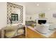Stylish living room with modern furnishings, including patterned console table and fireplace at 4526 Longwood Dr, Charlotte, NC 28209