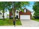 Charming two-story brick home features a well-manicured lawn and inviting curb appeal at 4982 Bentgrass Run Dr, Charlotte, NC 28269