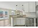 Beautiful kitchen with stainless steel appliances, custom cabinets, and granite countertops at 4982 Bentgrass Run Dr, Charlotte, NC 28269