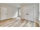 Light-filled bedroom featuring natural light from a window and a closet with double doors at 513 Sacco St, Belmont, NC 28012