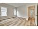 Bright bedroom with light gray walls and luxury vinyl plank flooring at 513 Sacco St, Belmont, NC 28012