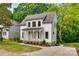 Charming two-story home with a well-manicured front yard and inviting entrance at 513 Sacco St, Belmont, NC 28012