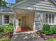 Inviting front porch with brick flooring and a classic exterior at 5436 Topping Pl, Charlotte, NC 28209