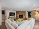 Comfortable living room with fireplace, large sectional sofa, and modern decor at 5436 Topping Pl, Charlotte, NC 28209