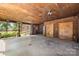 A wooden carport featuring a tiki bar with lake views at 6836 Summer Hill Dr, Denver, NC 28037