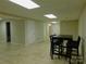 Spacious basement with recessed lighting, tiled floors, and ample room for entertaining at 714 Shady Dr, Albemarle, NC 28001