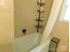 Bathroom highlighting a clean bathtub with shower and tiled walls at 714 Shady Dr, Albemarle, NC 28001