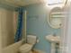 Bathroom features a shower/tub, a sink with lighting, and a toilet at 714 Shady Dr, Albemarle, NC 28001