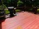 Outdoor deck featuring a grill perfect for entertaining and relaxing on a sunny day at 714 Shady Dr, Albemarle, NC 28001