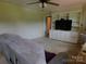 Bright living room featuring a built-in entertainment center and comfortable seating at 714 Shady Dr, Albemarle, NC 28001