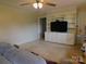 Spacious living room with built-in shelving and a cozy seating area at 714 Shady Dr, Albemarle, NC 28001