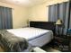 Main bedroom with a large bed, soft lighting, and a calming atmosphere at 714 Shady Dr, Albemarle, NC 28001