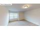 Bedroom featuring neutral carpet, a window and ample natural light at 7172 Sylvan Retreat Dr, Denver, NC 28037