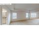 Spacious main bedroom with tray ceiling, carpet floors, and bright bathroom at 7172 Sylvan Retreat Dr, Denver, NC 28037