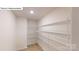 Large walk-in closet with ample shelving for optimal storage and organization at 7172 Sylvan Retreat Dr, Denver, NC 28037