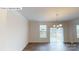 Bright dining area with wood floors and sliding glass doors to a patio or backyard at 7190 Sylvan Retreat Dr, Denver, NC 28037