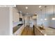 Well-equipped kitchen featuring stainless appliances, gas cooktop, granite, and ample storage at 7190 Sylvan Retreat Dr, Denver, NC 28037