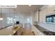 Well-appointed kitchen with stainless appliances, granite counters, and an island sink at 7190 Sylvan Retreat Dr, Denver, NC 28037