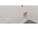 The laundry room offers a dedicated hookup space and wood-look flooring at 804 Candy Dr, Statesville, NC 28677