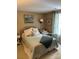 Bedroom showcasing a cozy bed, neutral walls, a ceiling fan and windows at 8350 Brickle Ln, Huntersville, NC 28078