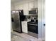 Well-equipped kitchen features stainless steel appliances and ample cabinet space at 8350 Brickle Ln, Huntersville, NC 28078