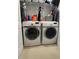 Laundry room features a side-by-side washer and dryer for convenience at 8350 Brickle Ln, Huntersville, NC 28078