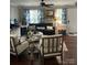Cozy living room with hardwood floors, comfortable seating, and stylish decor at 8350 Brickle Ln, Huntersville, NC 28078