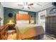 A cozy bedroom features stylish decor, including a brown headboard, and unique wall art at 840 10Th Street Nw Blvd, Hickory, NC 28601