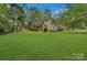 Expansive backyard, great for recreation, entertaining, or simply enjoying nature and outdoor activities at 9040 Scottsboro Dr, Huntersville, NC 28078