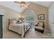 Inviting bedroom with a ceiling fan, window, and comfortable reading nook at 9040 Scottsboro Dr, Huntersville, NC 28078
