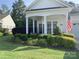 Charming single-story home featuring a well-manicured lawn and inviting covered front porch at 919 Lily Magnolia Ct, Fort Mill, SC 29707