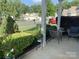 Inviting covered front porch with comfortable seating and beautiful landscaping at 919 Lily Magnolia Ct, Fort Mill, SC 29707