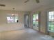 Spacious living room with neutral carpet, classic architectural details, and natural light at 919 Lily Magnolia Ct, Fort Mill, SC 29707