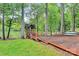 Backyard view of lake with seating area and kayaks at 921 Northeast Dr, Davidson, NC 28036