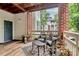 Welcoming balcony with outdoor seating, potted plants, and a scenic view for relaxing at 921 Northeast Dr, Davidson, NC 28036